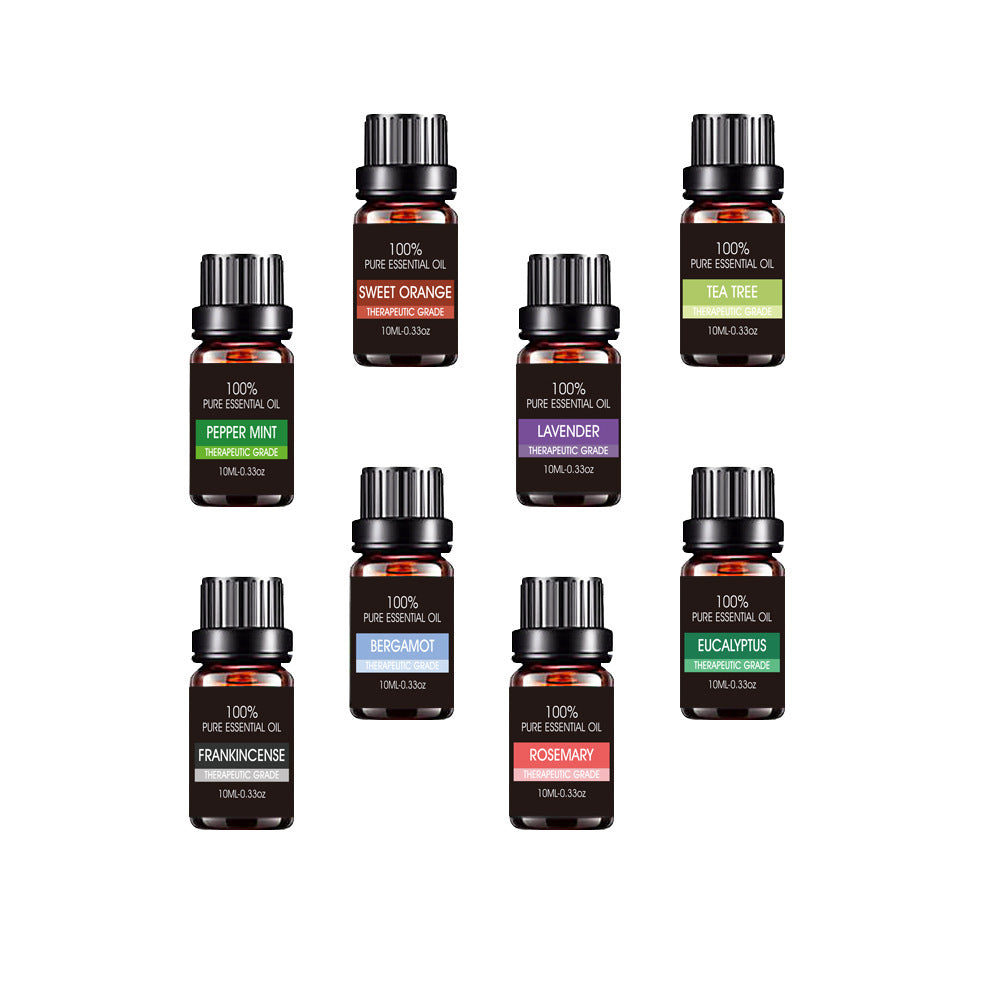 set of natural essential oil bottles arranged for aromatherapy use