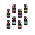 set of natural essential oil bottles arranged for aromatherapy use